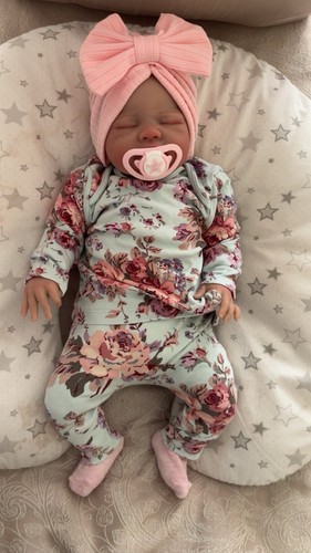 Weighted reborn baby doll - ,