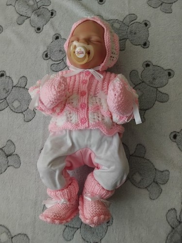 Hand knitted pink - , and