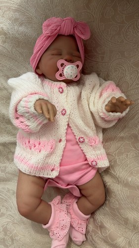 Weighted reborn baby doll - ,