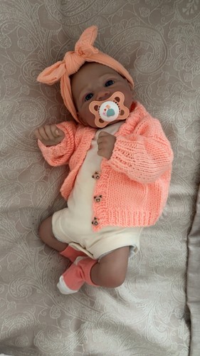 Weighted reborn baby doll - ,