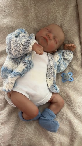 Weighted reborn baby doll - ,